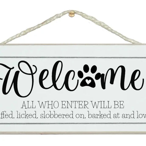 Welcome... sniffed, licked, slobbered on... dog animal sign